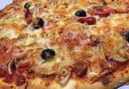 Pizza with sausage and cheese at home - simple recipes